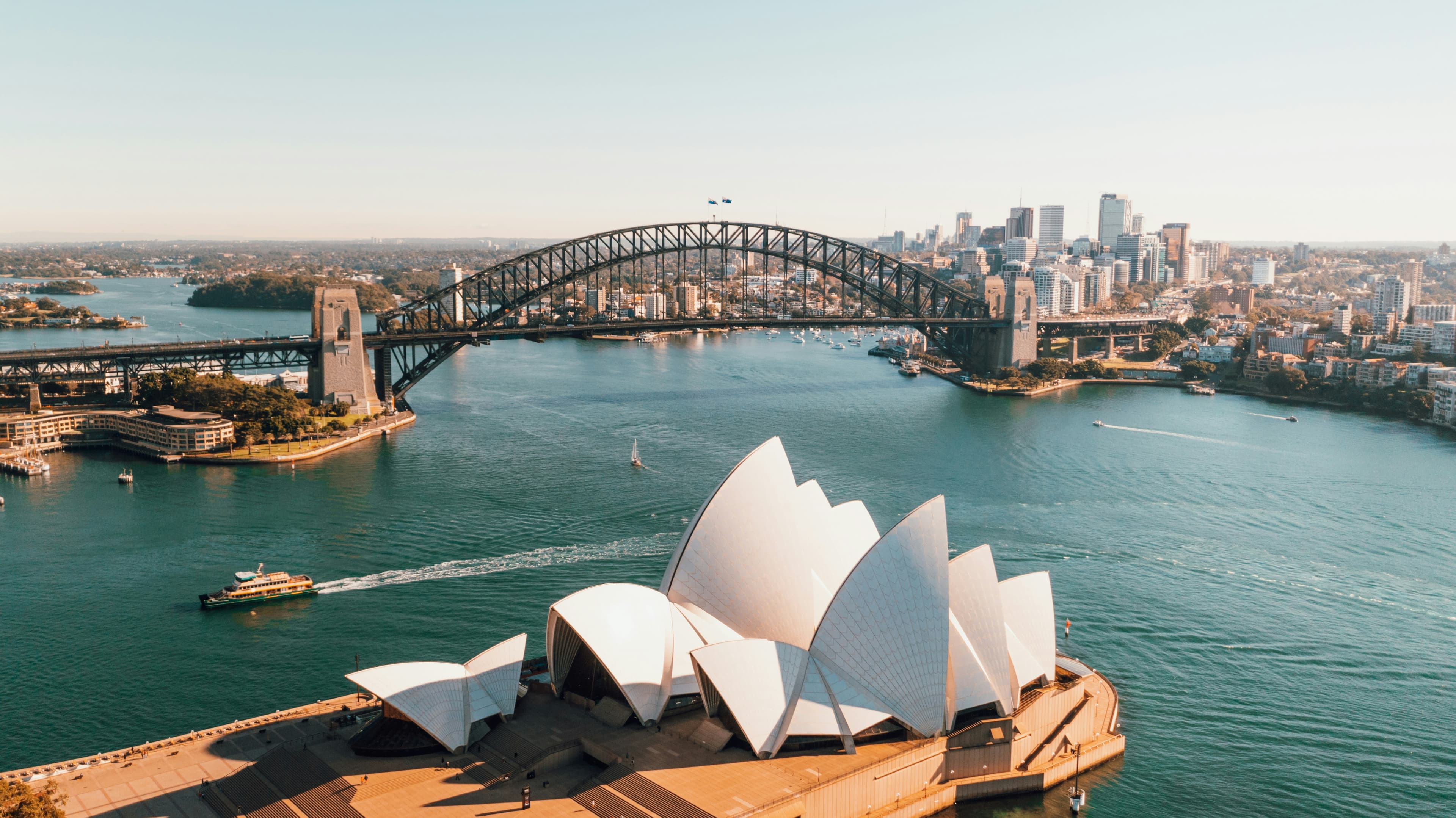 Sydney Harbour skyline featuring the Opera House and Harbour Bridge