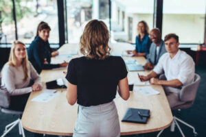 Australia artificial intelligence team leading a business meeting on ai consulting and automation strategy.