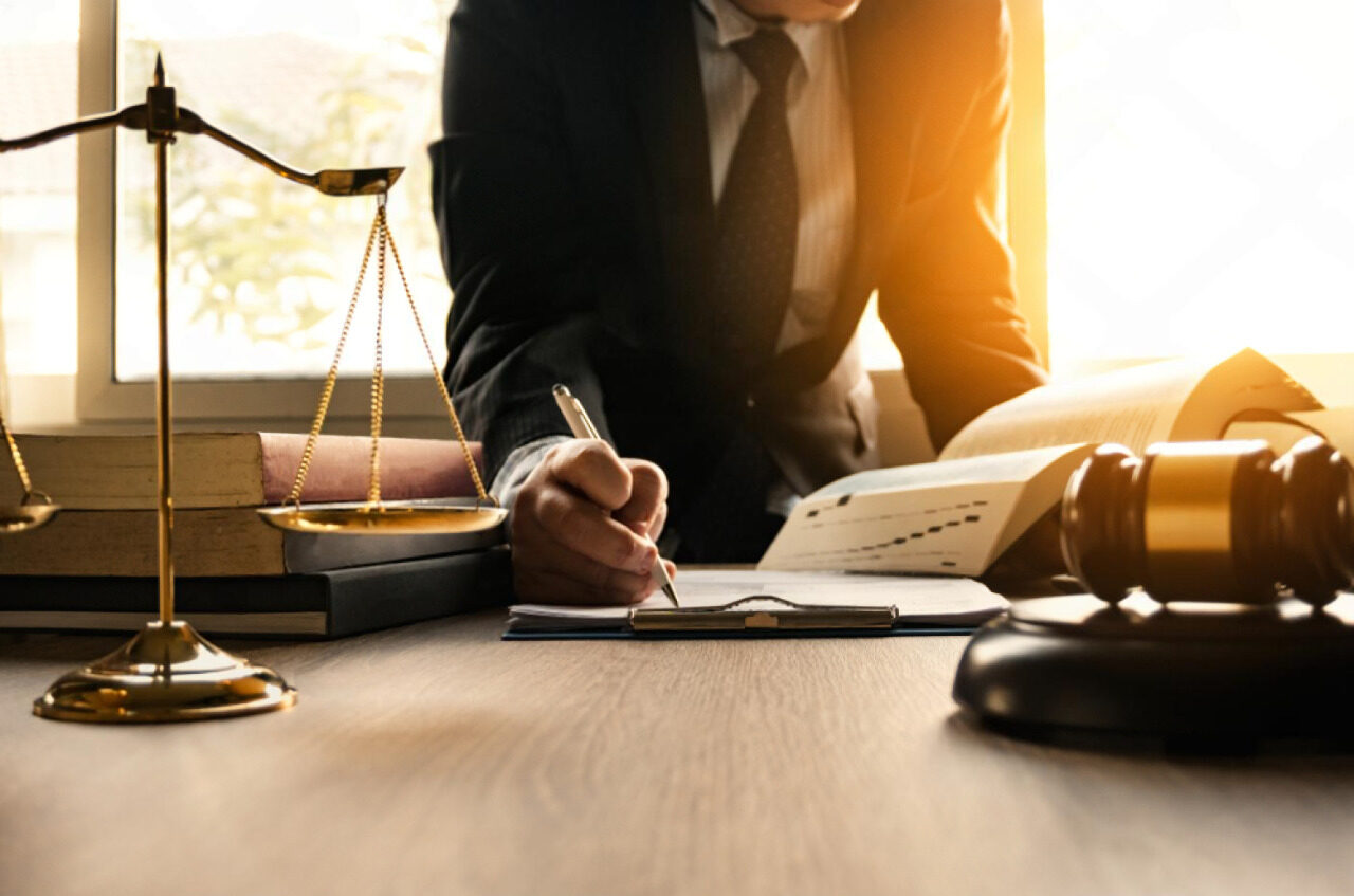 Australian executives reviewing AI governance and legal compliance dashboard.